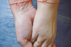 What a Red String Tattoo Represents